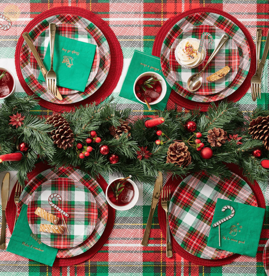 Red and green plaid Christmas tableware and greenery centerpiece holiday table decor from Parte Haus party supply store in Bethesda MD