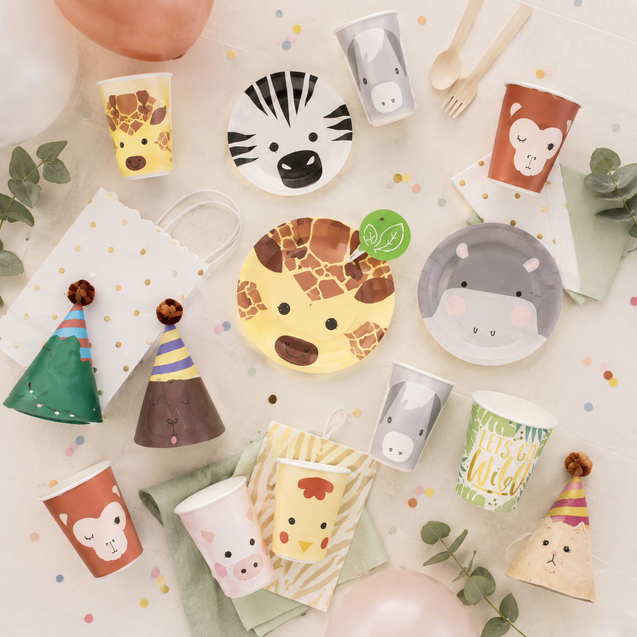 Yellow giraffe zebra monkey and hippo animal face plates for kids birthday from Parte Haus party supply store in Bethesda MD