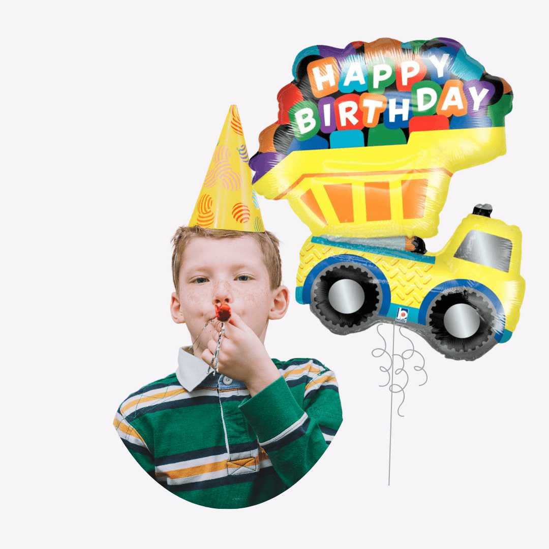 Yellow dump truck happy birthday balloon and boy in party hat birthday theme from Parte Haus party supply store in Bethesda MD