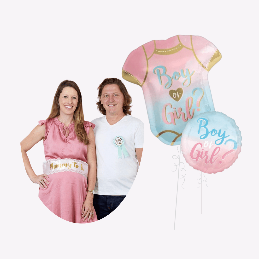 Pink and blue gender reveal balloons and happy couple with mommy to be sash from Parte Haus party supply store in Bethesda Maryland