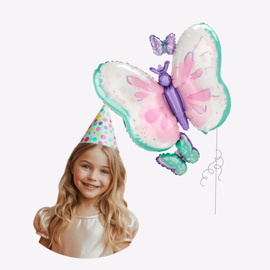 Colorful butterfly balloons and a smiling girl with polka dot party hat girls birthday from Parte Haus party supply store in Bethesda MD