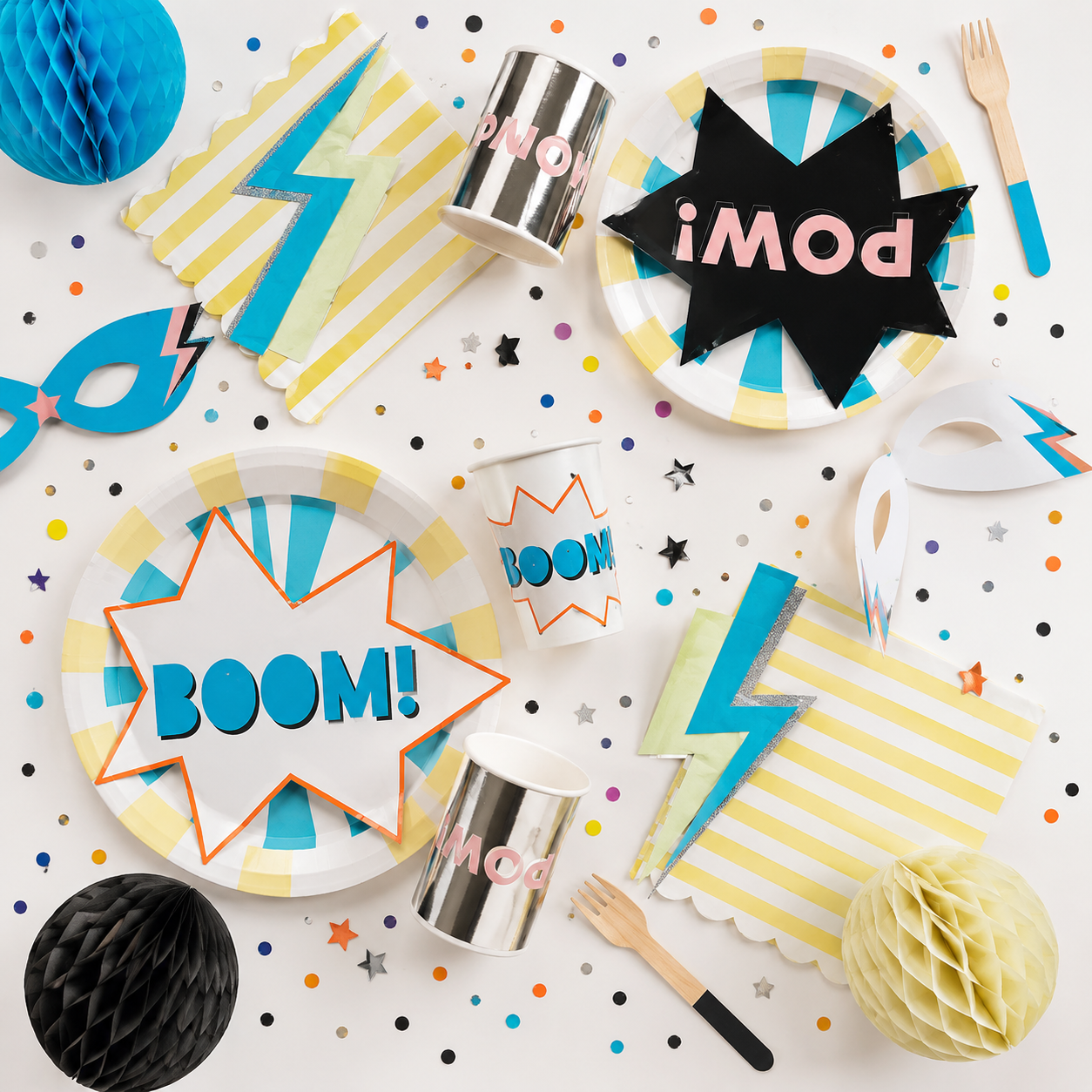 Colorful superhero comic small plates with fun text for kids birthday from Parte Haus party supply store in Bethesda Maryland