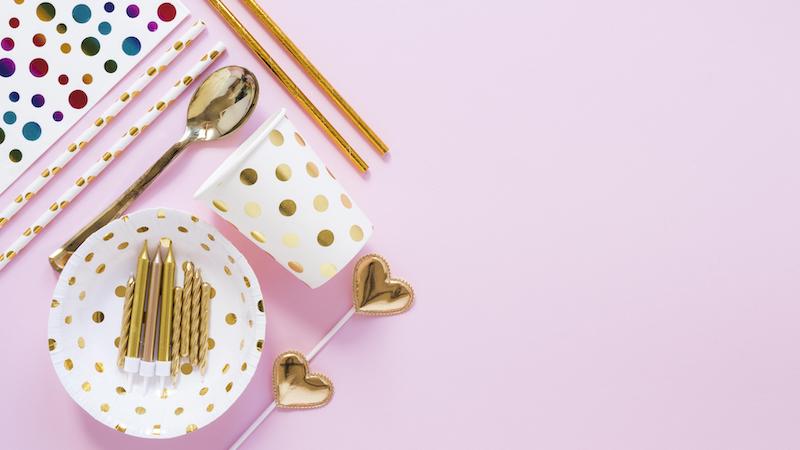 gold and white polka dot birthday plates cups straws and hearts on pink from Parte Haus party supply store in Bethesda MD