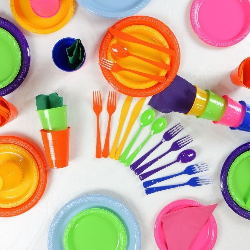 Colorful plastic tableware set with plates cups and cutlery for birthday from Parte Haus party supply store in Bethesda MD