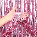 Pink metallic fringe backdrop with shiny tinsel for birthday from Parte Haus party supply store in Bethesda MD