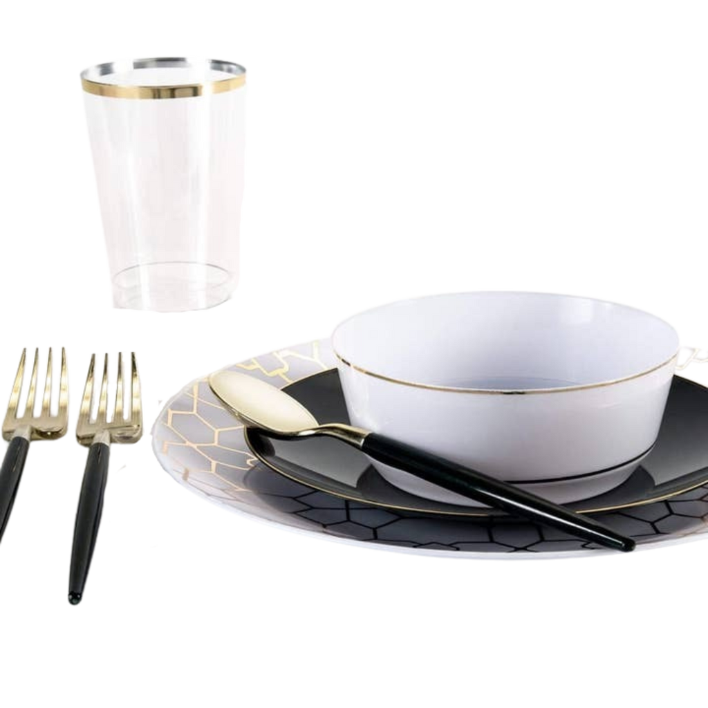 Black and gold dinnerware place setting for formal celebrations from Parte Haus party supply store in Bethesda MD