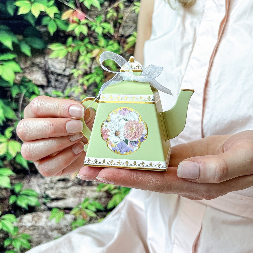 Green floral teapot favor box with ribbon for tea party theme from Parte Haus party supply store in Bethesda MD