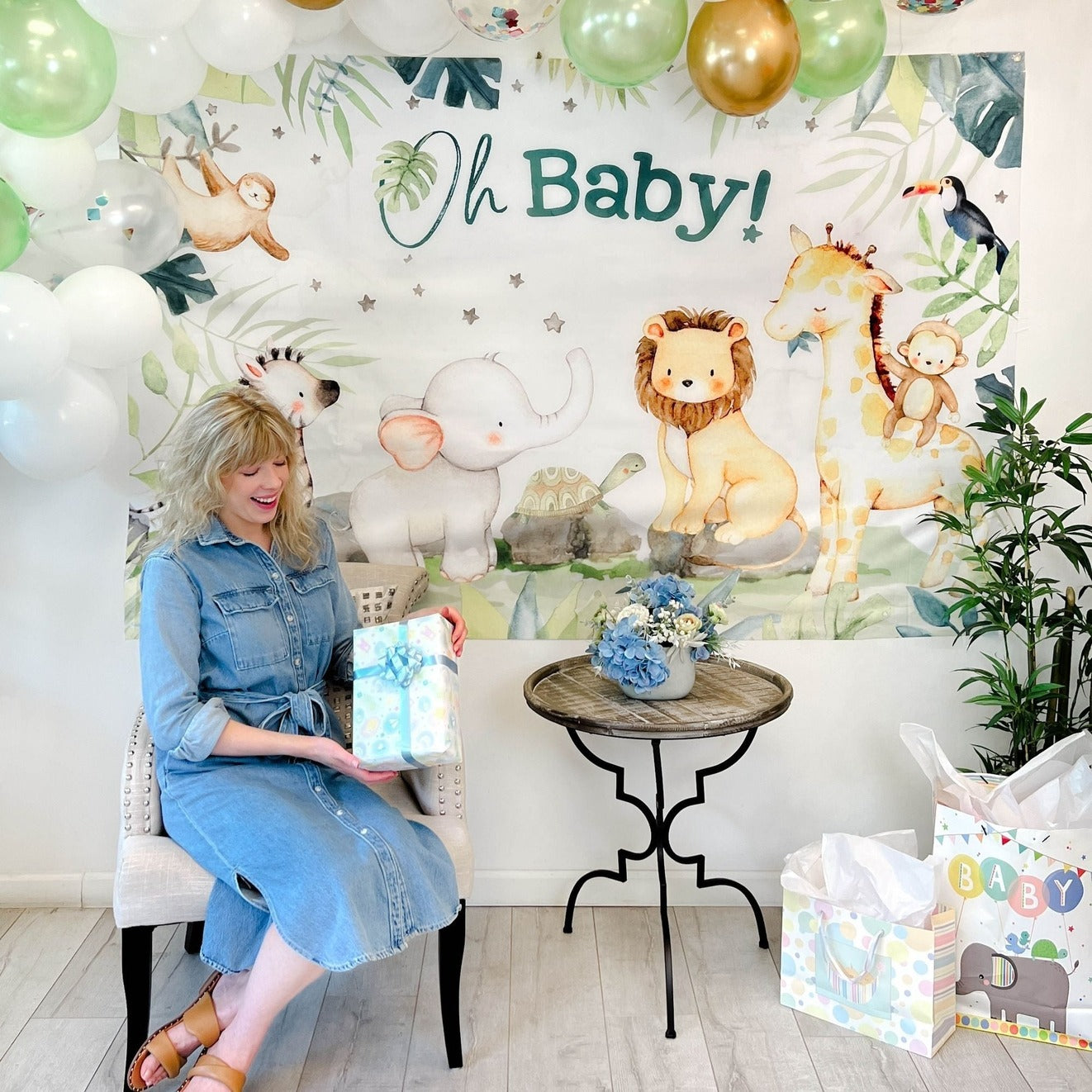 Blue and white baby shower banner with jungle animals and balloons from Parte Haus party supply store in Bethesda MD