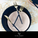 Navy and blush dinnerware set with gold flatware for modern celebration from Parte Haus party supply store in Bethesda MD.