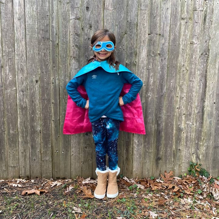 Blue and pink superhero costume child outfit for birthday theme from Parte Haus party supply store in Bethesda MD