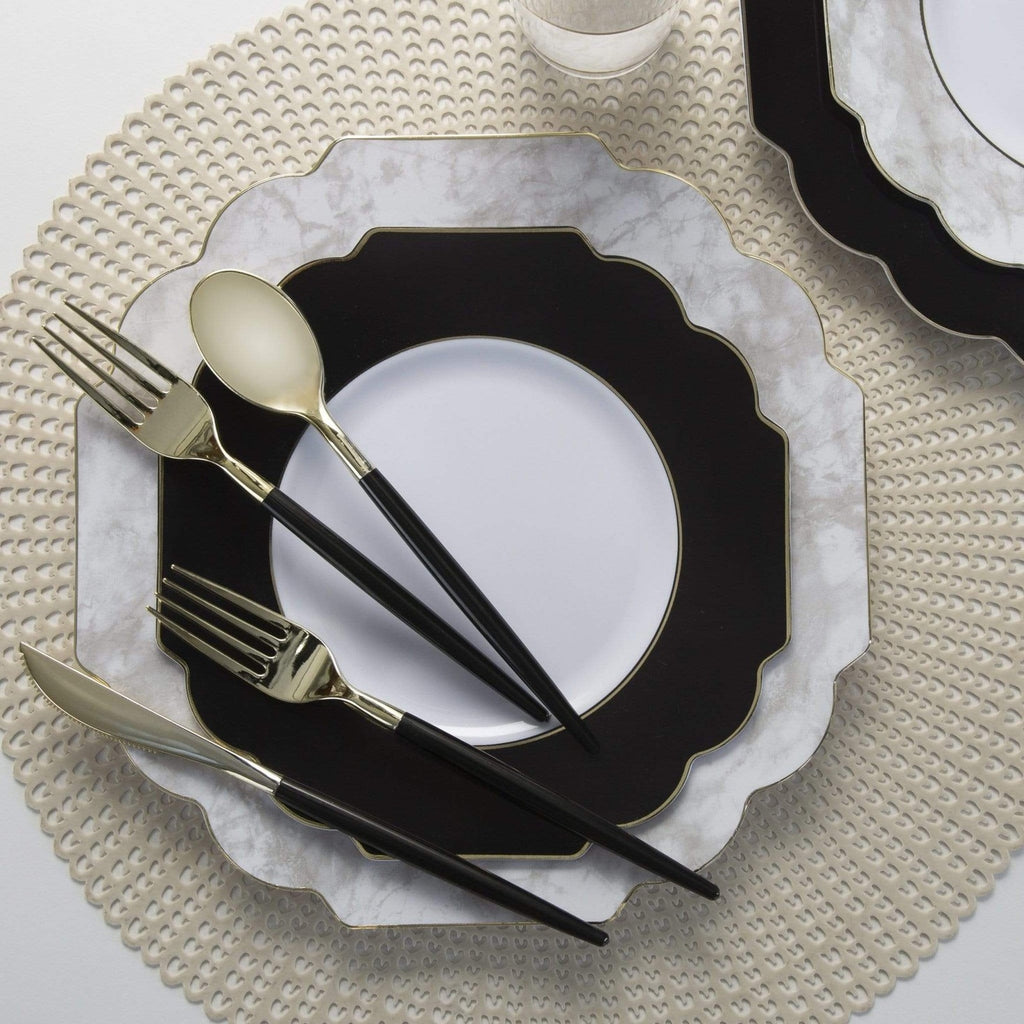 Black and gold cutlery set with marble plates elegant table setting for celebration from Parte Haus party supply store in Bethesda Maryland