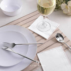 White modern dinnerware and silver flatware set elegant tableware for celebrations from Parte Haus party supply store in Bethesda MD