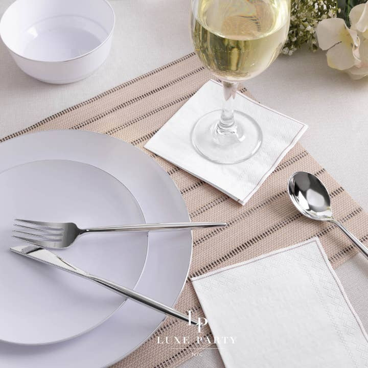 White modern dinnerware and silver flatware set elegant tableware for celebrations from Parte Haus party supply store in Bethesda MD