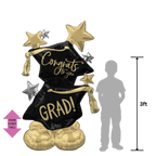 Black and gold graduation balloon bouquet with cap shapes and stars Graduation theme from Parte Haus party supply store in Bethesda MD