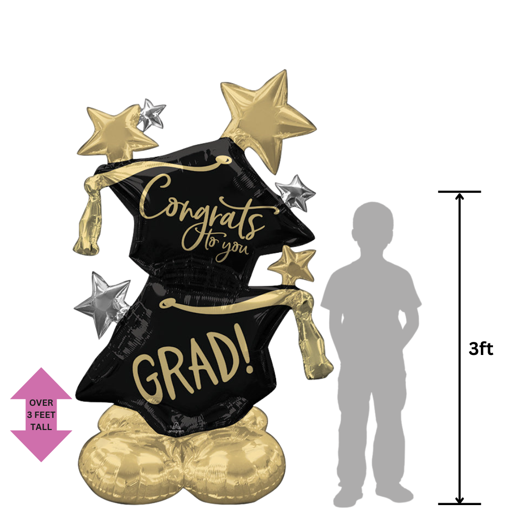 Black and gold graduation balloon bouquet with cap shapes and stars Graduation theme from Parte Haus party supply store in Bethesda MD