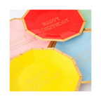 Yellow red blue and pink Happy Birthday plates with gold trim birthday theme from Parte Haus party supply store in Bethesda MD