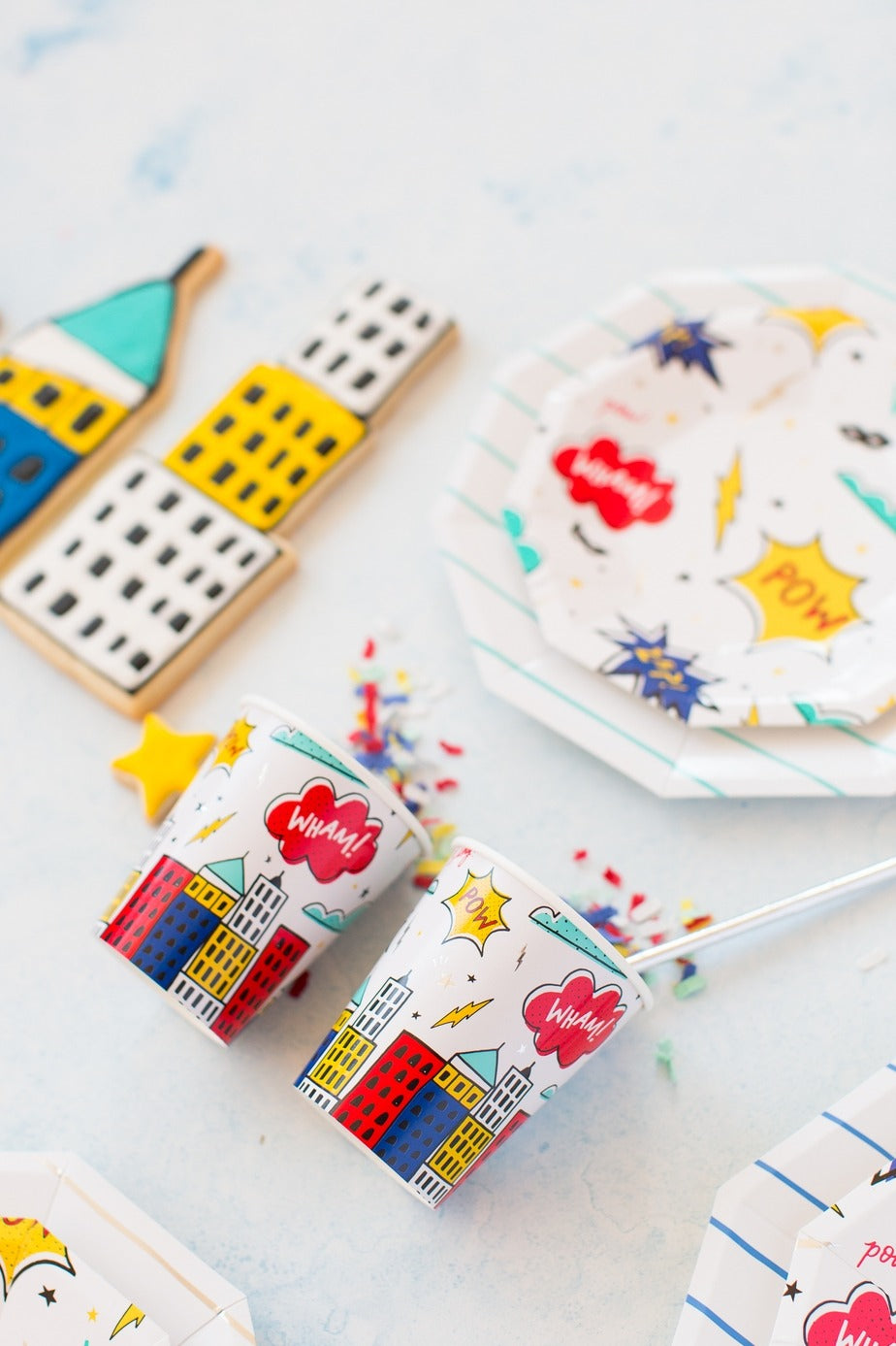 Colorful comic superhero cups and plates for kids birthday from Parte Haus party supply store in Bethesda Maryland