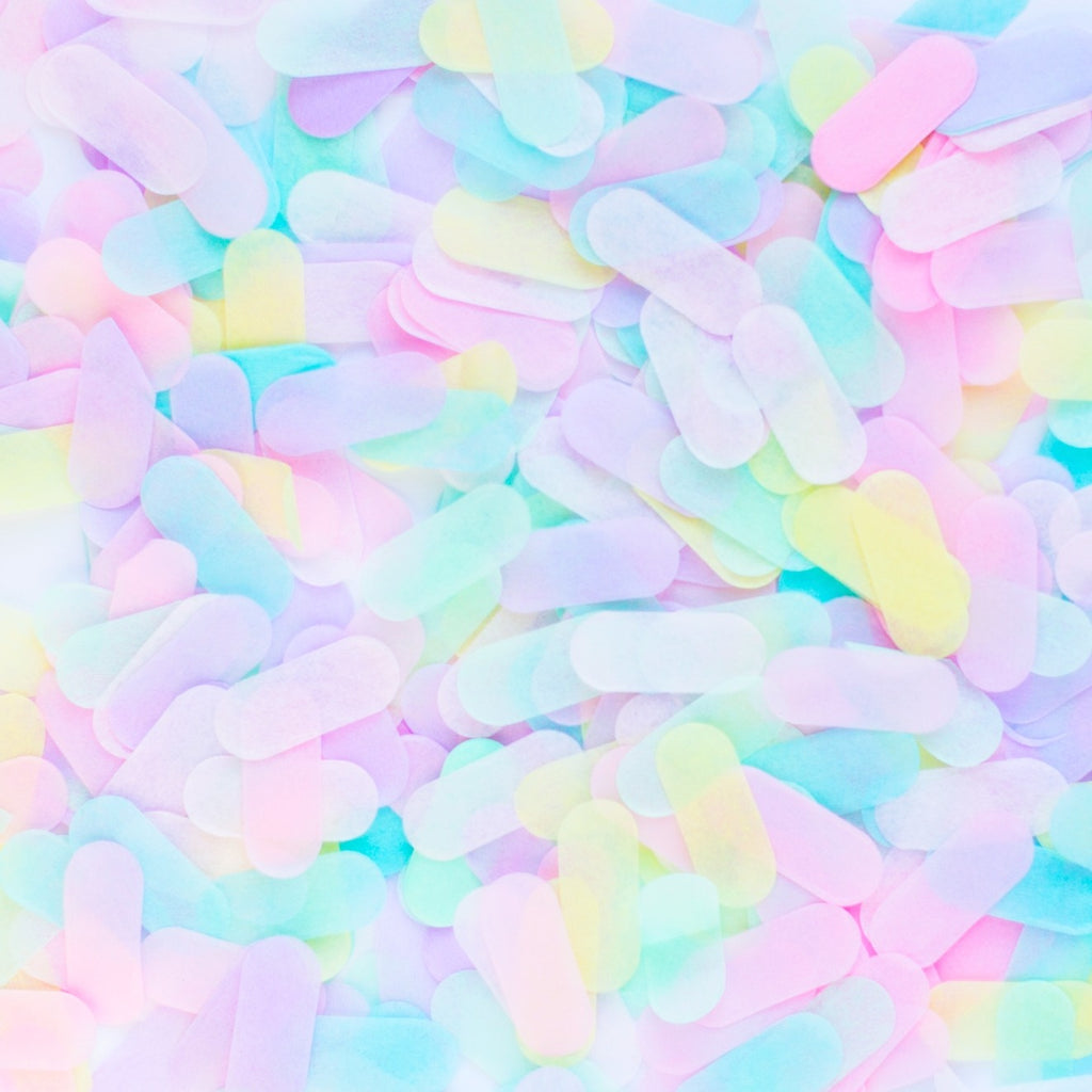 Pastel rainbow confetti oval tissue circles for birthday celebration from Parte Haus party supply store in Bethesda MD.
