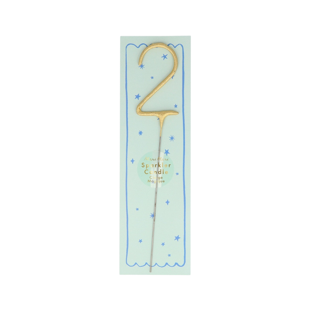 Gold number two sparkler birthday candle on blue card from Parte Haus party supply store in Bethesda MD
