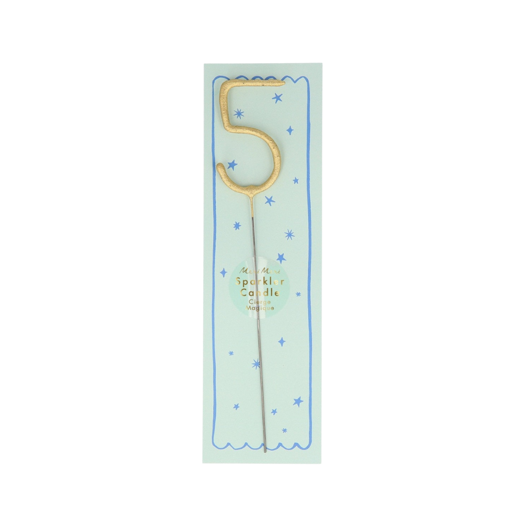 Gold number 5 sparkler candle on blue card birthday decoration from Parte Haus party supply store in Bethesda MD