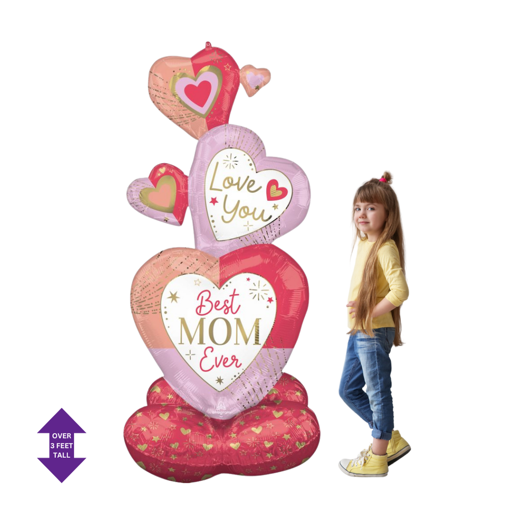 Pink and red heart shaped balloon for Mother’s Day with child from Parte Haus party supply store in Bethesda Maryland