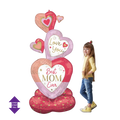 Pink and red heart shaped balloon for Mother’s Day with child from Parte Haus party supply store in Bethesda Maryland