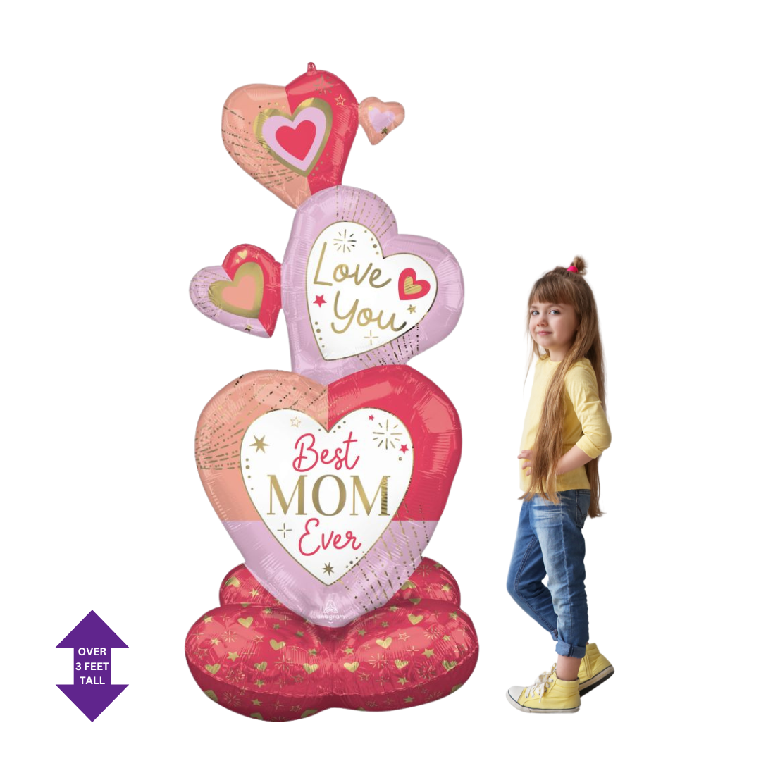 Pink and red heart shaped balloon for Mother’s Day with child from Parte Haus party supply store in Bethesda Maryland