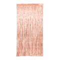 Rose gold foil fringe curtain backdrop for birthdays from Parte Haus party supply store in Bethesda MD.
