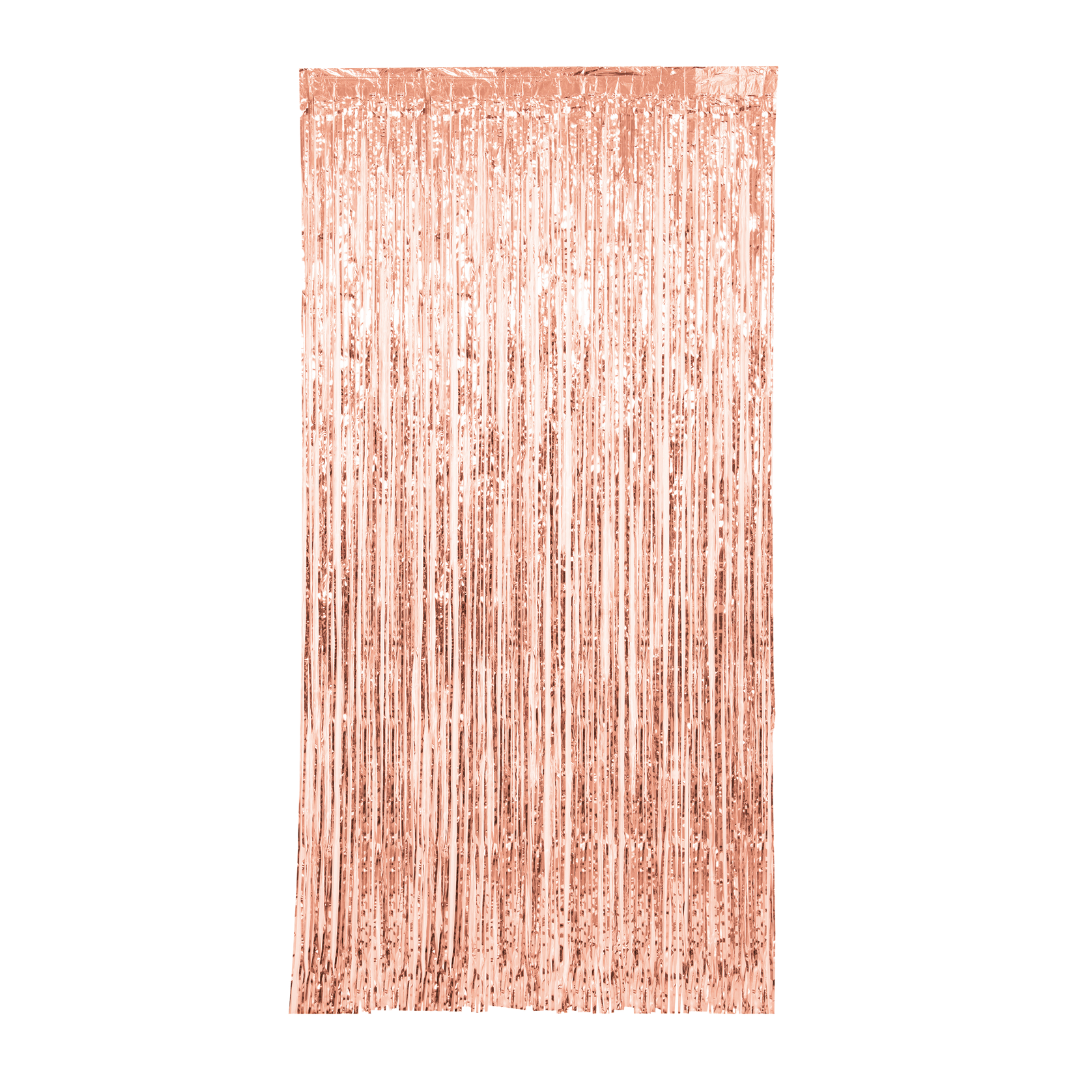 Rose gold foil fringe curtain backdrop for birthdays from Parte Haus party supply store in Bethesda MD.