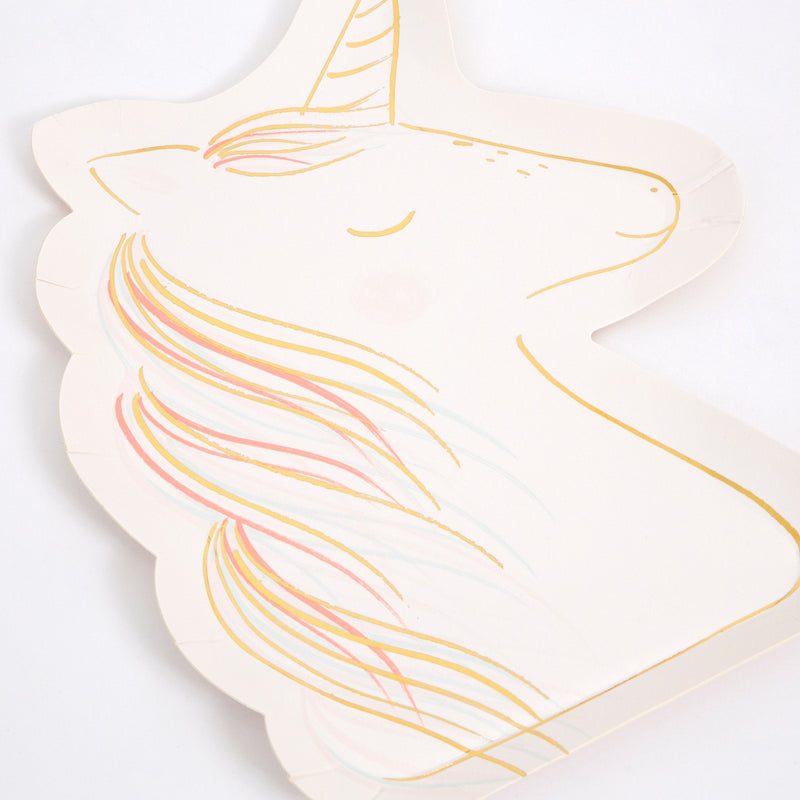White unicorn shaped plate with pastel gold pink and blue details unicorn theme from Parte Haus party supply store in Bethesda MD