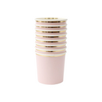 Blush pink paper cups with gold rim stacked for birthday celebration from Parte Haus party supply store in Bethesda MD