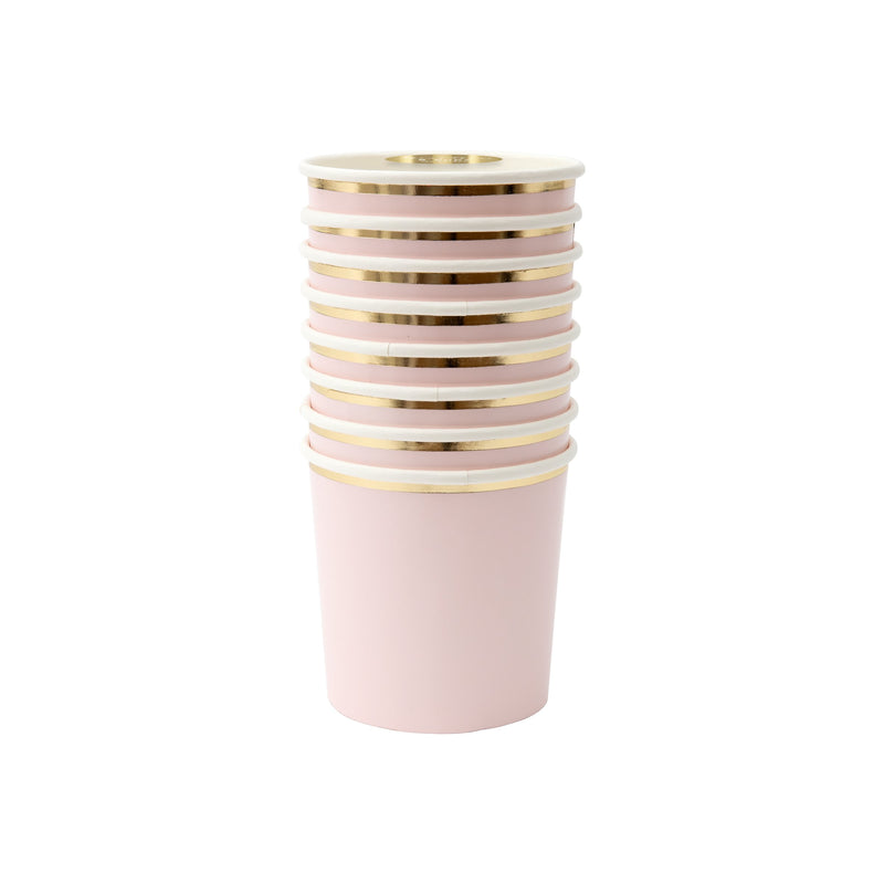 Blush pink paper cups with gold rim stacked for birthday celebration from Parte Haus party supply store in Bethesda MD