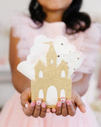 Gold castle napkin holder with white napkins princess birthday decor from Parte Haus party supply store in Bethesda MD