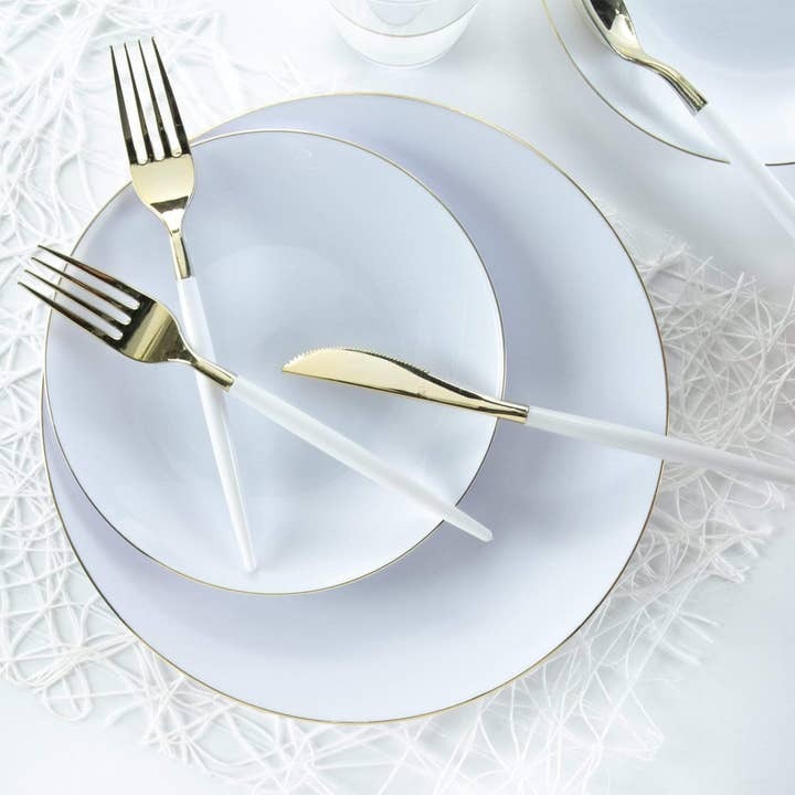 White and gold plastic cutlery and plates elegant dinner tableware for celebration from Parte Haus party supply store in Bethesda MD