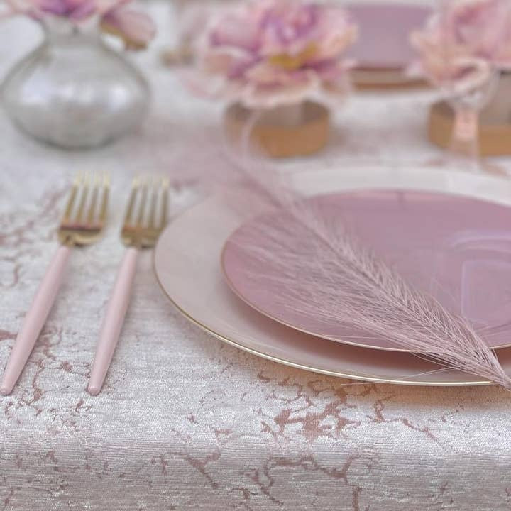 Blush pink table setting with plates and flowers elegant bridal shower decor from Parte Haus party supply store in Bethesda MD