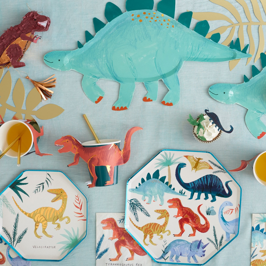 multicolor dinosaur plates cups and napkins for birthday from Parte Haus party supply store in Bethesda MD