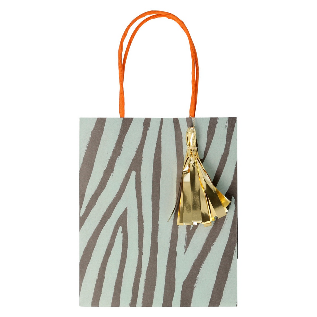 Gray zebra stripe gift bag with gold tassel birthday from Parte Haus party supply store in Bethesda MD