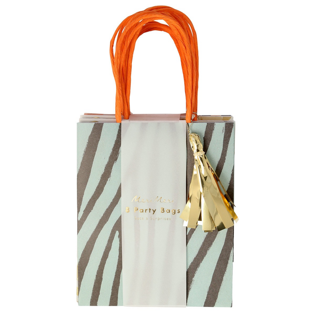 Mint and gold gift bag with orange handles and metallic tassel for birthday celebration from Parte Haus party supply store in Bethesda MD