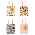 Animal print gift bags with gold tassels wild theme from Parte Haus party supply store in Bethesda MD