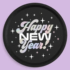 Black New Year plate with holographic Happy New Year text and sparkles from Parte Haus party supply store in Bethesda MD