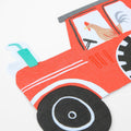 Red tractor decoration with a chicken farm theme from Parte Haus party supply store in Bethesda MD