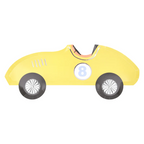 Yellow race car shaped plate with number 8 birthday theme from Parte Haus party supply store in Bethesda MD
