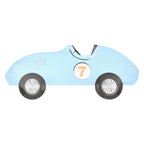 Blue race car shaped plate with silver wheels for birthday theme from Parte Haus party supply store in Bethesda Maryland