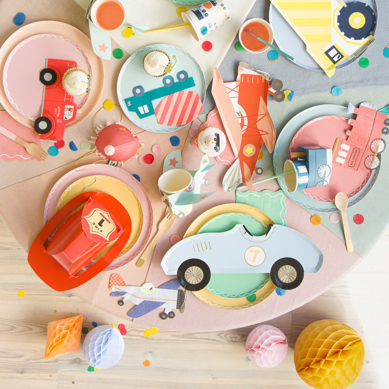 Colorful car and truck themed kids plates and cups for birthday from Parte Haus party supply store in Bethesda MD