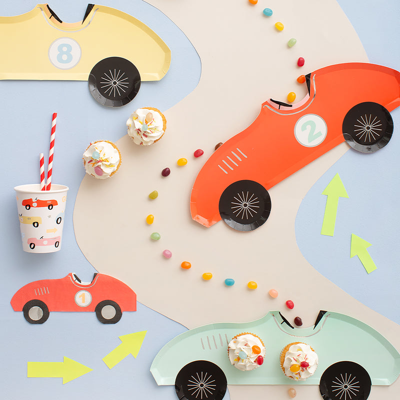 Colorful race car shaped plates and cupcakes kids birthday theme from Parte Haus party supply store in Bethesda MD