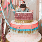 Pink and gold giant cake prop with fringe and confetti birthday theme from Parte Haus party supply store in Bethesda Maryland