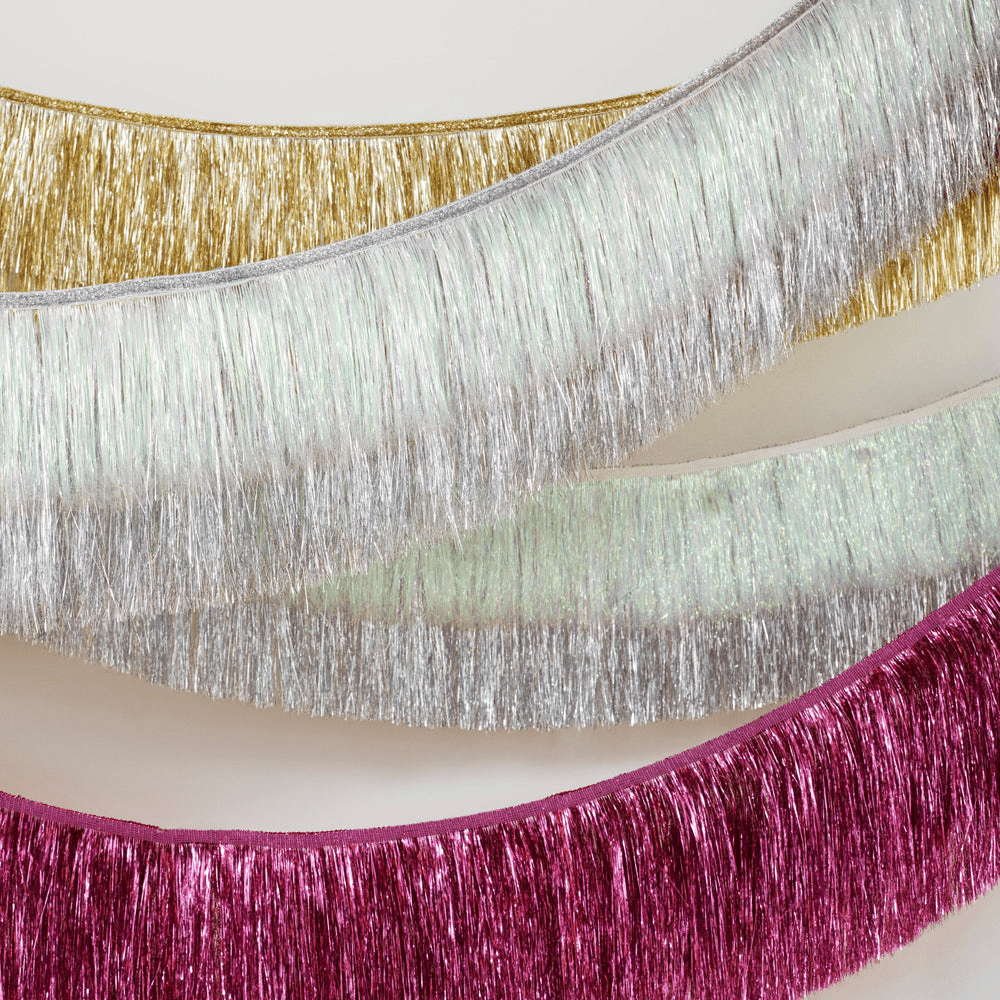 Gold silver and pink tinsel garland fringe banner decor for celebration from Parte Haus party supply store in Bethesda Maryland