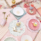 Pastel floral paper plates and cups on pink gingham table for spring celebration from Parte Haus party supply store in Bethesda MD