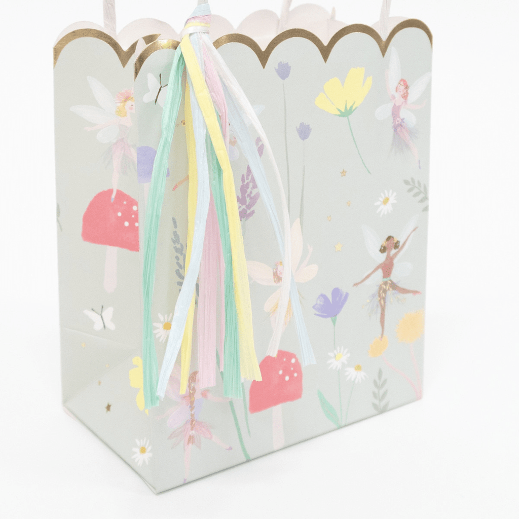 Pastel fairy themed gift bag with tassel and floral design for kids birthday from Parte Haus party supply store in Bethesda Maryland