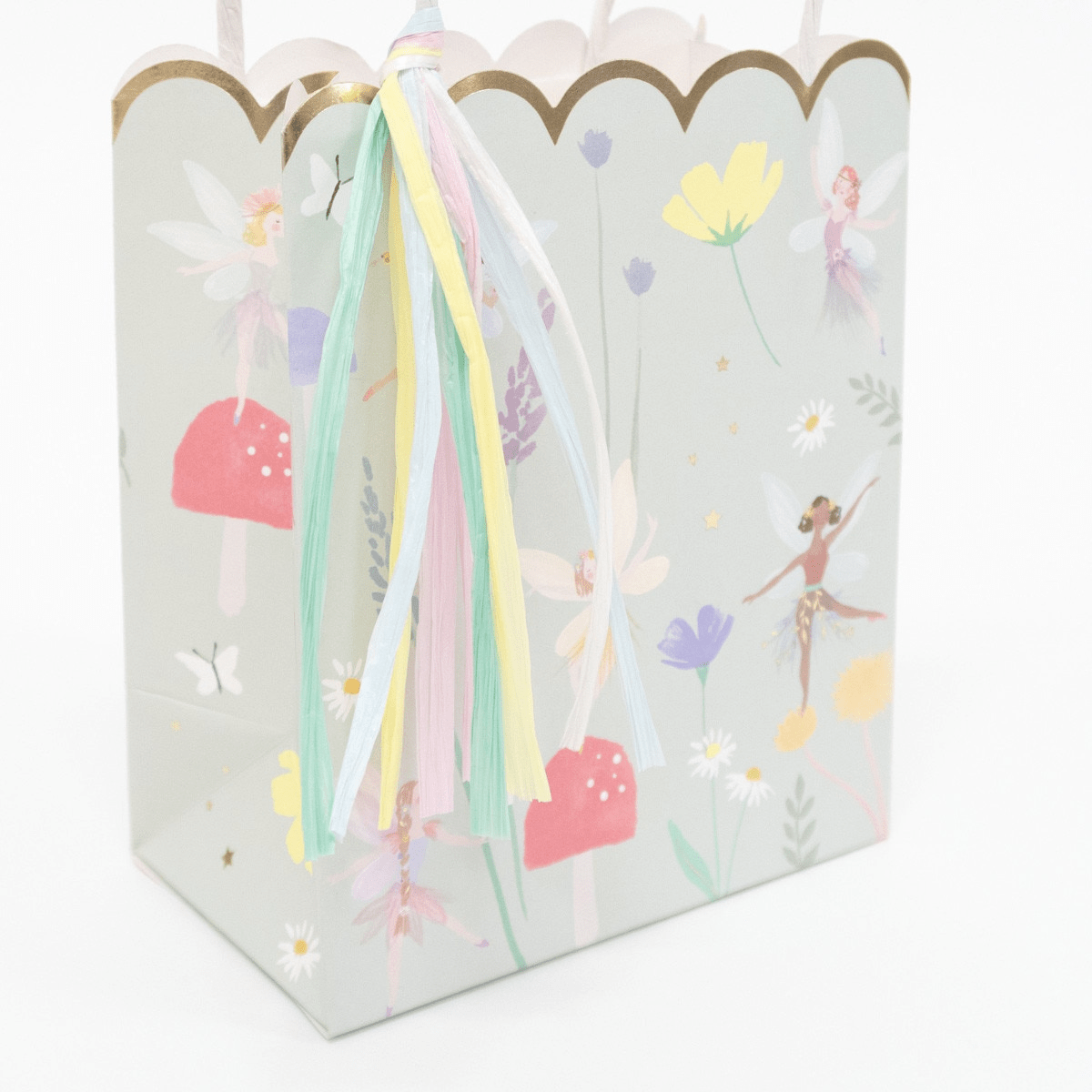 Pastel fairy themed gift bag with tassel and floral design for kids birthday from Parte Haus party supply store in Bethesda Maryland